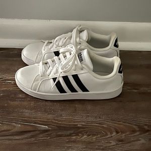 Adidas tennis shoes.